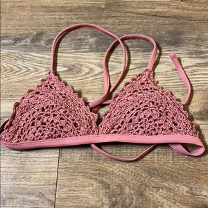 pink colored crocheted bikini top